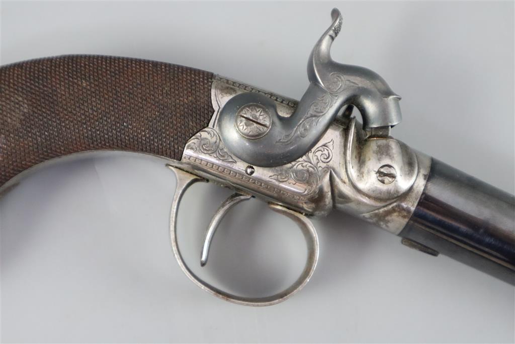 An early 19th century twin barrel flintlock pocket pistol, by Jn. & Geo. Jones of London, length 7.5in